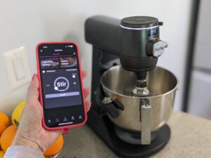 GE Profile Smart Stand Mixer on a counter with app.