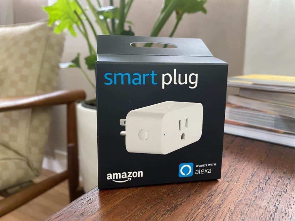 amazon smart plug, sitting on a table.