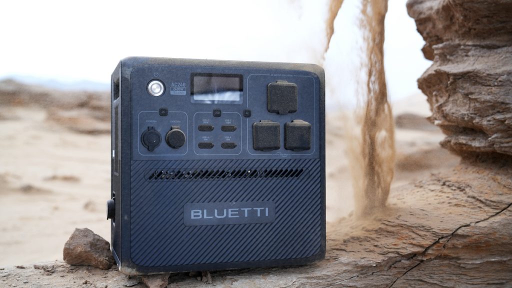 Bluetti AC240 portable power on a beach.